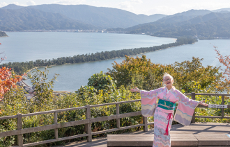 Cliffe posing in front of Amanohashidate in Kyoto
