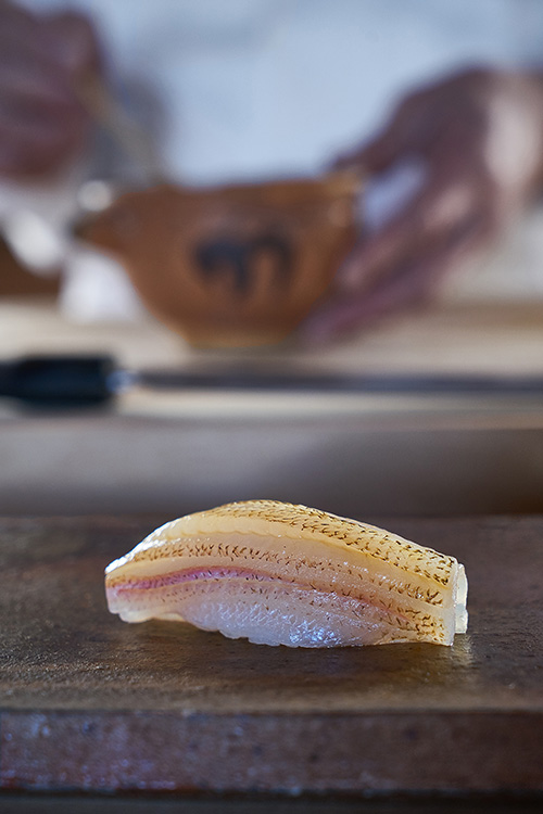 alt="kisu whiting nigiri sushi at Kikuzushi, photographed by Andrea Fazzari"